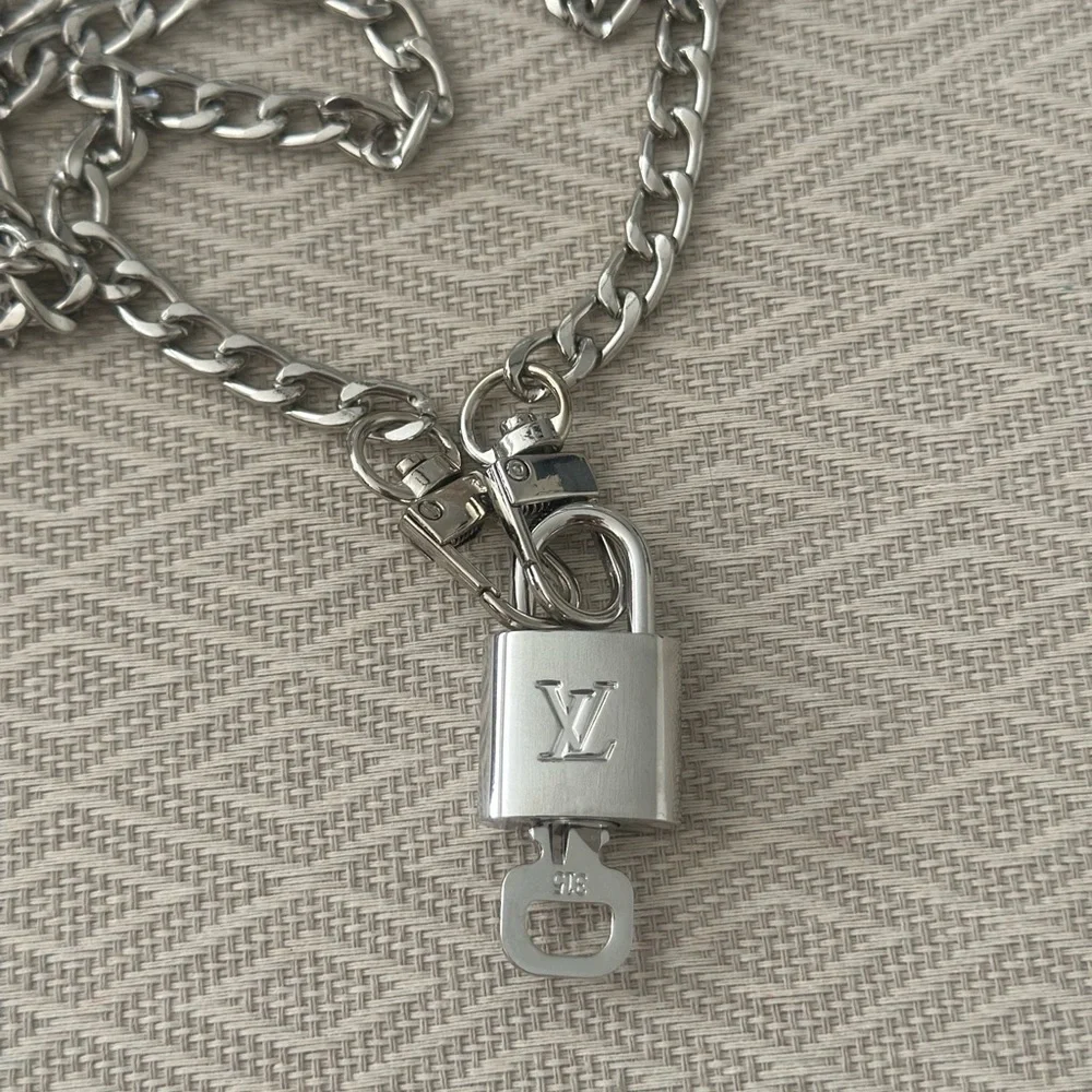Louis Vuitton Silver Padlock w/ key & 27” Chain   to be worn as necklace